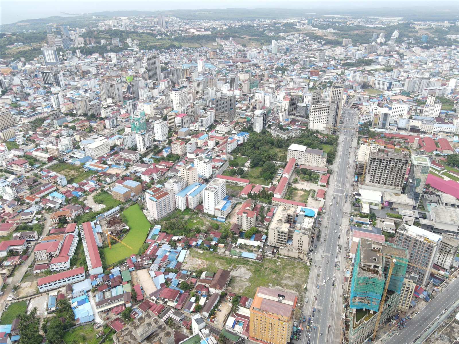 Aerial view of Sihanoukville buildings and streets near the Two Lions Roundabout in August 2022
