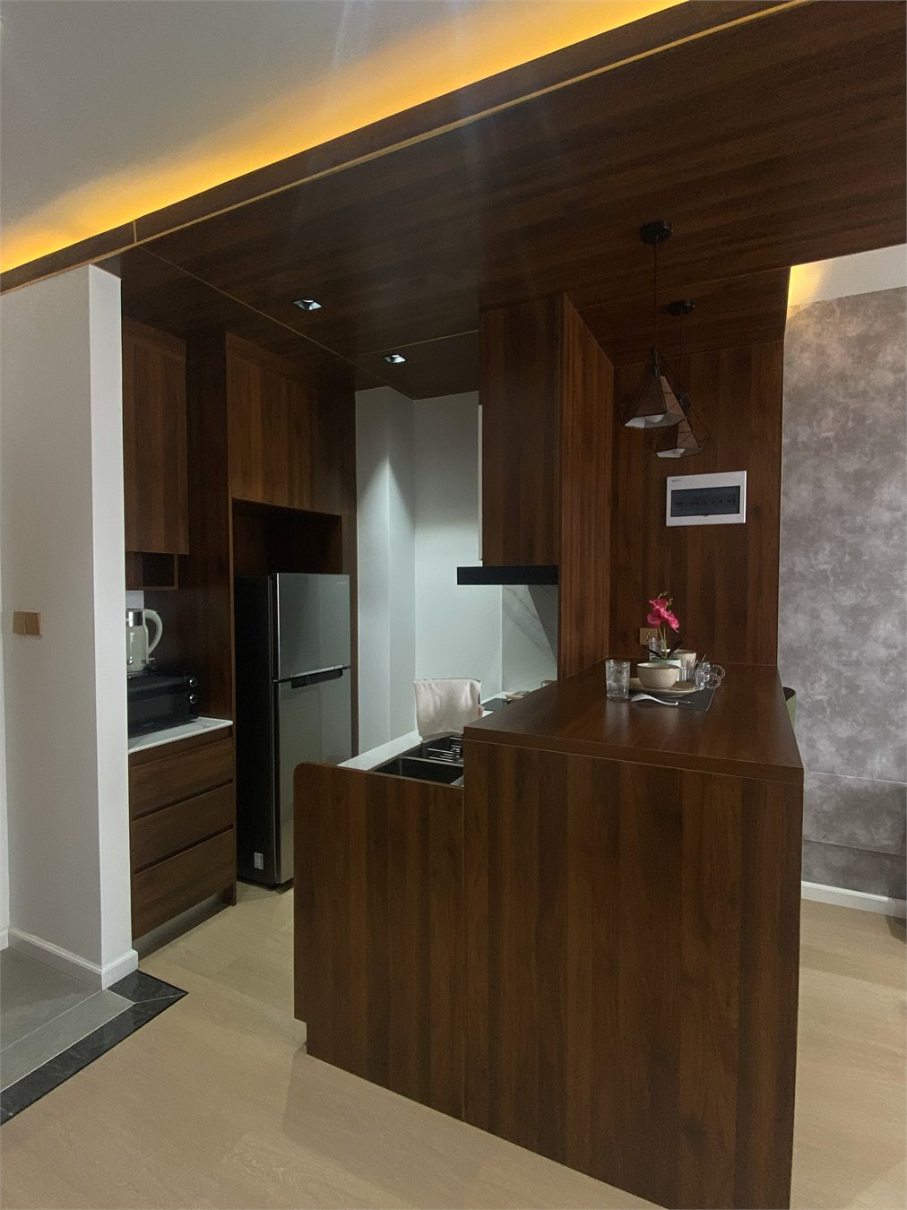 Warm Finish Furnished One Bedroom Residence interior at The Pinnacle Residence in Phnom Penh